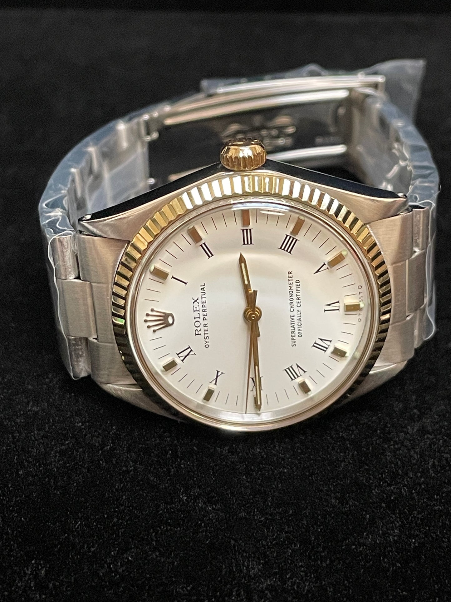 1969 Rolex Oyster Perpetual 5500 White Roman Dial Gold Bezel SS Oyster 34mm