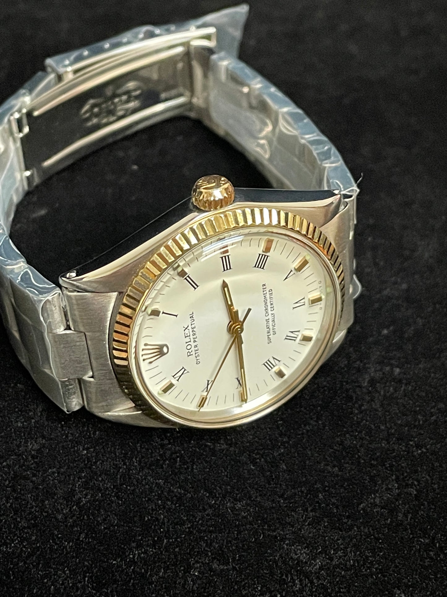 1969 Rolex Oyster Perpetual 5500 White Roman Dial Gold Bezel SS Oyster 34mm