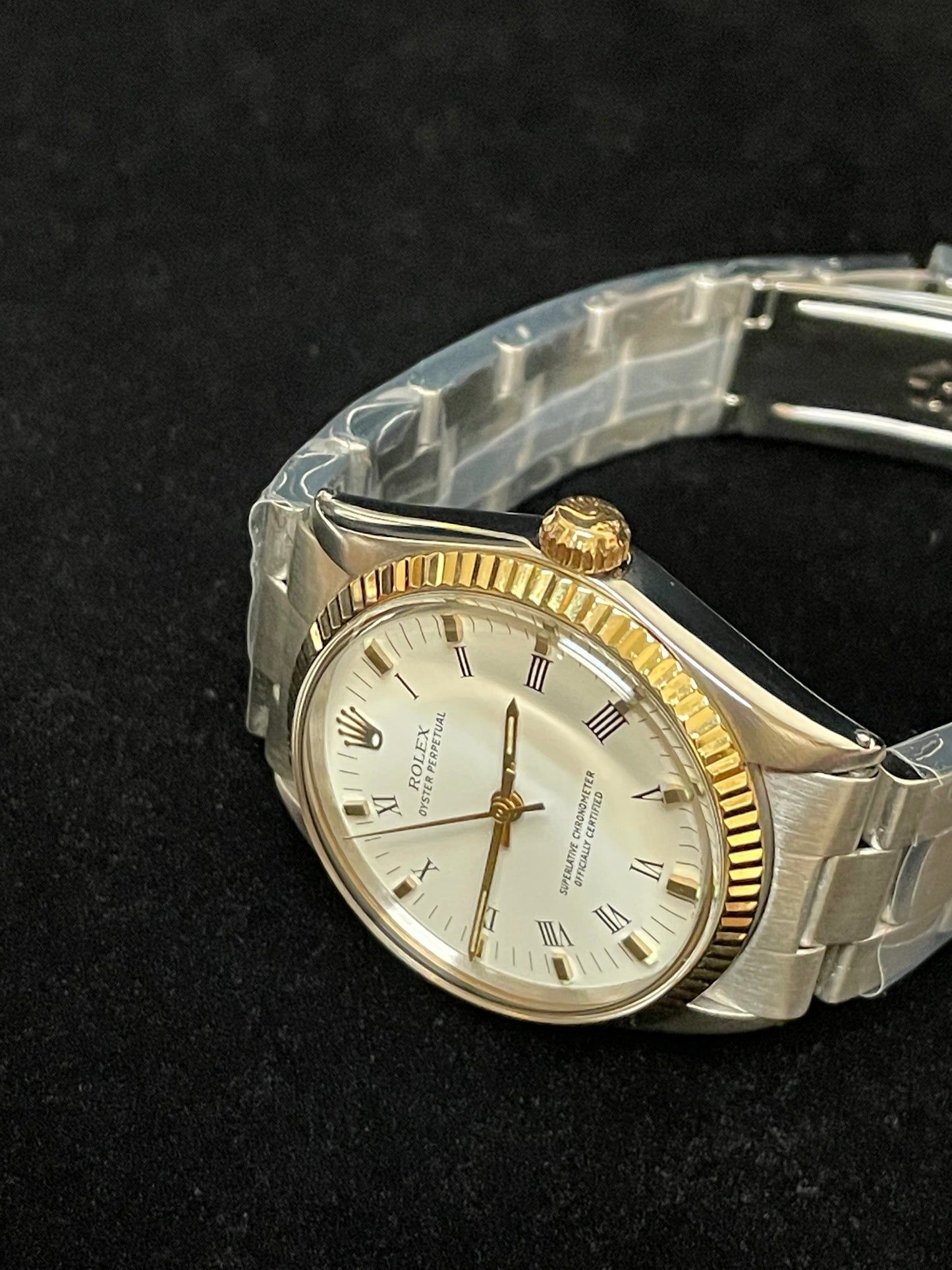 1969 Rolex Oyster Perpetual 5500 White Roman Dial Gold Bezel SS Oyster 34mm